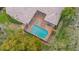 Aerial view of the pool and surrounding patio at 16312 Dunlindale Dr, Lithia, FL 33547