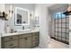 Contemporary bathroom with floating vanity and walk-in shower at 16312 Dunlindale Dr, Lithia, FL 33547
