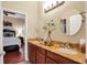 Spacious bathroom with dual vanities, granite countertops, and ample storage at 16312 Dunlindale Dr, Lithia, FL 33547