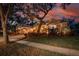 Evening view of house exterior with landscaping at 16312 Dunlindale Dr, Lithia, FL 33547