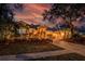 Beautiful home exterior at dusk with landscaping at 16312 Dunlindale Dr, Lithia, FL 33547