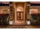 Impressive entryway with double doors and stone columns at 16312 Dunlindale Dr, Lithia, FL 33547