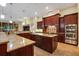 Large kitchen with granite counters, island, and stainless steel appliances at 16312 Dunlindale Dr, Lithia, FL 33547