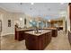 Large kitchen with expansive island, sink, and breakfast bar at 16312 Dunlindale Dr, Lithia, FL 33547