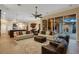 Open concept living room with sliding glass doors leading to the backyard at 16312 Dunlindale Dr, Lithia, FL 33547