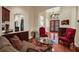 Spacious living room with hardwood floors and comfortable seating at 16312 Dunlindale Dr, Lithia, FL 33547