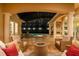 Relaxing outdoor patio with fire pit and comfortable seating at 16312 Dunlindale Dr, Lithia, FL 33547