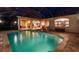 Night view of a relaxing pool and spa area at 16312 Dunlindale Dr, Lithia, FL 33547