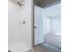 Bathroom with shower stall and adjacent bedroom at 16719 Delia St, Wimauma, FL 33598