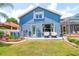 Spacious backyard with deck and pool view at 2015 Wexford Green Dr, Valrico, FL 33594