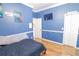 Bright bedroom with wood floors and double closets at 2015 Wexford Green Dr, Valrico, FL 33594