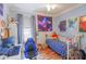 Bedroom with full-size bed, workspace and decor at 2015 Wexford Green Dr, Valrico, FL 33594