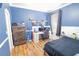 Bedroom with a bed, desk and gaming chair at 2015 Wexford Green Dr, Valrico, FL 33594