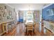 Elegant dining room with hardwood floors and a large window at 2015 Wexford Green Dr, Valrico, FL 33594