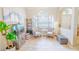 Relaxing living area with two armchairs and a large window at 2015 Wexford Green Dr, Valrico, FL 33594