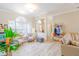 Inviting living room with comfy seating and access to foyer at 2015 Wexford Green Dr, Valrico, FL 33594