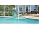 Refreshing pool area with patio and seating at 2015 Wexford Green Dr, Valrico, FL 33594
