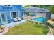 A refreshing pool area with a screened enclosure, deck, and lounge chairs at 2015 Wexford Green Dr, Valrico, FL 33594