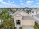 Attractive single-Gathering home with a two-car garage and manicured lawn at 211 Shell Creek Ct, Apollo Beach, FL 33572