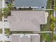 Top-down view of a house showing the roofline and landscaping at 211 Shell Creek Ct, Apollo Beach, FL 33572