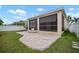 Screened patio and landscaped backyard at 211 Shell Creek Ct, Apollo Beach, FL 33572