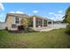 Large backyard with screened porch at 211 Shell Creek Ct, Apollo Beach, FL 33572