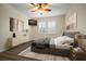 Comfortable bedroom with a king-size bed and a stylish dresser at 211 Shell Creek Ct, Apollo Beach, FL 33572