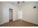 Bright bedroom with wood floors and access to bathroom at 211 Shell Creek Ct, Apollo Beach, FL 33572