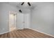 Spacious bedroom with wood floors and large closet at 211 Shell Creek Ct, Apollo Beach, FL 33572