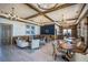 Elegant clubhouse interior with comfortable seating and a bar at 211 Shell Creek Ct, Apollo Beach, FL 33572