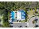 Community pool with lounge chairs and a surrounding patio area at 211 Shell Creek Ct, Apollo Beach, FL 33572