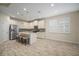 Modern kitchen with stainless steel appliances and island at 211 Shell Creek Ct, Apollo Beach, FL 33572