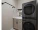 Modern laundry room with LG washer and dryer at 211 Shell Creek Ct, Apollo Beach, FL 33572