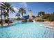 Large resort-style pool with a waterslide and a spacious deck at 211 Shell Creek Ct, Apollo Beach, FL 33572