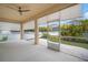 Relaxing screened porch overlooking backyard at 211 Shell Creek Ct, Apollo Beach, FL 33572