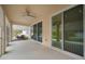 Spacious screened porch with sliding glass doors at 211 Shell Creek Ct, Apollo Beach, FL 33572
