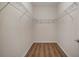 Large walk-in closet with wire shelving at 211 Shell Creek Ct, Apollo Beach, FL 33572