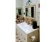Bathroom with updated vanity and decorative mirror at 22481 Westchester Blvd # A23, Punta Gorda, FL 33980
