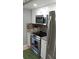 Modern kitchen with stainless steel appliances at 22481 Westchester Blvd # A23, Punta Gorda, FL 33980