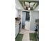 Kitchen with laundry area and tile flooring at 22481 Westchester Blvd # A23, Punta Gorda, FL 33980
