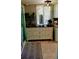 White kitchen cabinet with decorative seaside theme at 22481 Westchester Blvd # A23, Punta Gorda, FL 33980