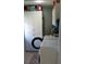 Bright laundry room with white cabinets and storage at 22481 Westchester Blvd # A23, Punta Gorda, FL 33980