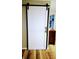 White sliding barn door leading to laundry area at 22481 Westchester Blvd # A23, Punta Gorda, FL 33980