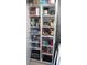 Well-organized pantry with ample shelving for food storage and kitchen appliances at 22481 Westchester Blvd # A23, Punta Gorda, FL 33980