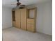 Bedroom with built-in wooden shelving and drawers at 2280 Toniwood Ln, Palm Harbor, FL 34685
