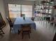 Dining room with table, chairs, and built-in mirrored storage at 2280 Toniwood Ln, Palm Harbor, FL 34685
