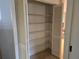 Walk-in pantry with wire shelving, ideal for storage at 2280 Toniwood Ln, Palm Harbor, FL 34685