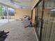 Pool area with covered patio and outdoor seating at 2280 Toniwood Ln, Palm Harbor, FL 34685