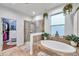 Modern bathroom with a large shower and tub at 2602 W Nassau St, Tampa, FL 33607