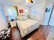 Bedroom with wood floors and a ceiling fan at 2602 W Nassau St, Tampa, FL 33607